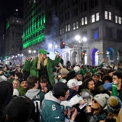 Alt text: Hundreds of Eagles fans crowd Broad Street to celebrate after the 2025 Super Bowl win.